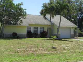 Foreclosed Home - 707 SE HIBISCUS AVE, 34996