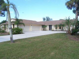Foreclosed Home - 8769 SW TROPICAL AVE, 34997