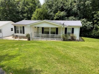 Foreclosed Home - 1120 OWL HOLLOW RD, 38549