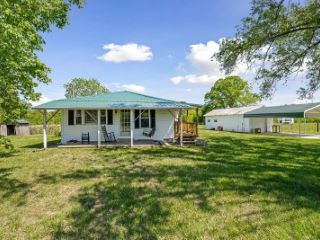 Foreclosed Home - 1217 THREE ISLAND RD, 38587