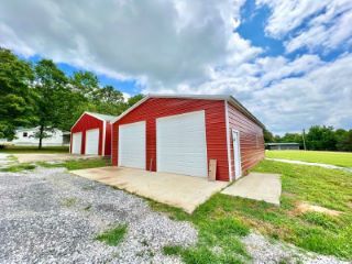 Foreclosed Home - 10926 ROCKCASTLE RD, 42038