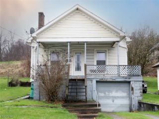 Foreclosed Home - 2419 COMMERCIAL AVE, 43938