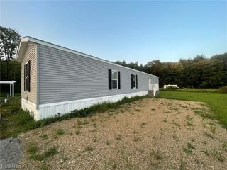 Foreclosed Home - 7029 WOODARD RD, 44003