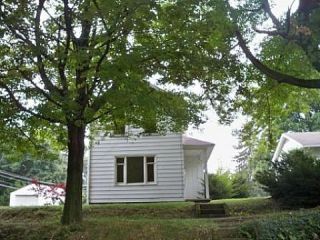 Foreclosed Home - 613 N PORTAGE ST, 44230