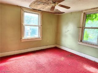 Foreclosed Home - 1129 7TH AVE, 44306