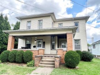 Foreclosed Home - 734 AMHERST RD NE, 44646