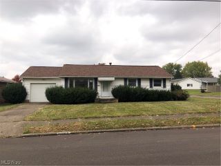 Foreclosed Home - 1022 15TH ST SW, 44647