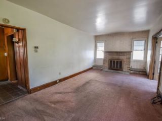 Foreclosed Home - 1528 26TH ST NW, 44709