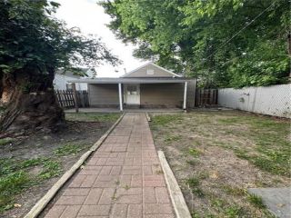 Foreclosed Home - 1218 E 8TH ST, 47150