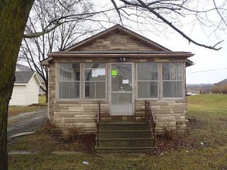 Foreclosed Home - 18842 HURON RIVER DR, 48173