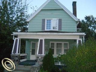 Foreclosed Home - 719 W MICHIGAN AVE, 48197