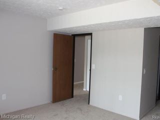 Foreclosed Home - 1571 W POND DR APT 32, 48864