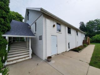 Foreclosed Home - 705 WHITNEY PL, 48880