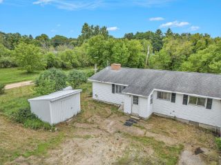 Foreclosed Home - 1064 S SHERIDAN RD, 48888