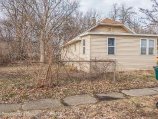 Foreclosed Home - 216 W THOMAS ST, 48906