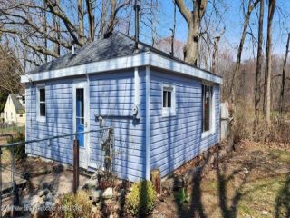 Foreclosed Home - 5830 ROLFE RD, 48911