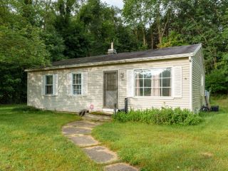 Foreclosed Home - 803 WASHINGTON AVE N, 49037