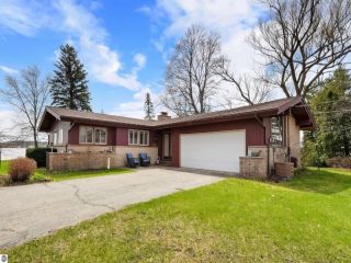 Foreclosed Home - 601 LAKE SHORE DR, 49601
