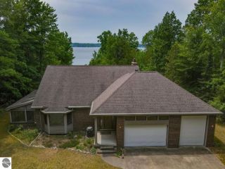 Foreclosed Home - 253 N EAST TORCH LAKE DR, 49622