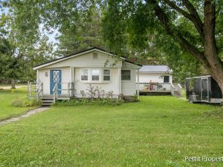Foreclosed Home - 9795 5 MILE RD, 49631