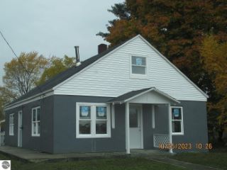 Foreclosed Home - 406 S MICHIGAN AVE, 49663