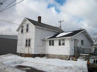 Foreclosed Home - 113 N TENTH ST, 49707