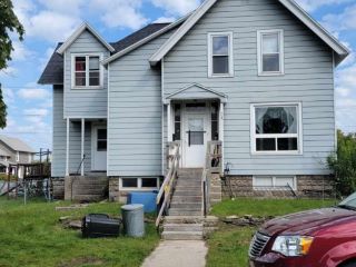 Foreclosed Home - 900 6TH AVE, 49858