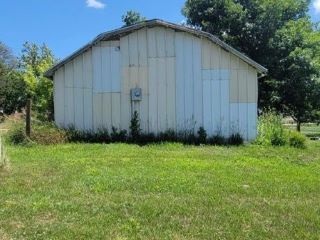 Foreclosed Home - 201 S 2ND ST, 51543