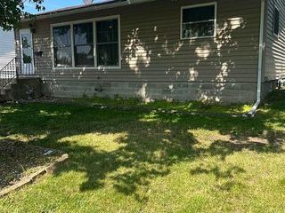 Foreclosed Home - 1006 OSWEGO ST, 52339