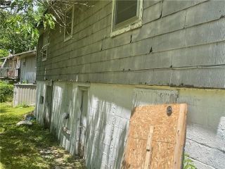 Foreclosed Home - 702 N ALLEN RD, 64050