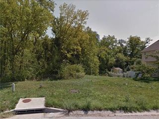 Foreclosed Home - 1111 N BELVIDERE AVE, 64056