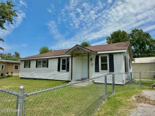 Foreclosed Home - 1115 S MCKINLEY AVE, 64801
