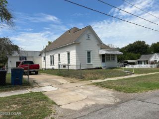 Foreclosed Home - 302 S MCKINLEY AVE, 64801