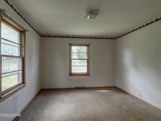 Foreclosed Home - 2720 E 6TH ST, 64801