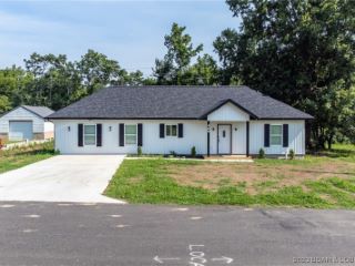 Foreclosed Home - 409 W 5TH ST, 65026