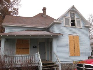 Foreclosed Home - 1032 N GRANT AVE, 65802