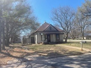 Foreclosed Home - 221 W 16TH ST, 67058