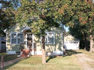 Foreclosed Home - 604 EAST AVE S, 67554