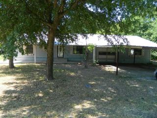 Foreclosed Home - 311 W TRAVIS ST, 75452