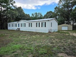Foreclosed Home - 101 PINEWOOD DR, 77371