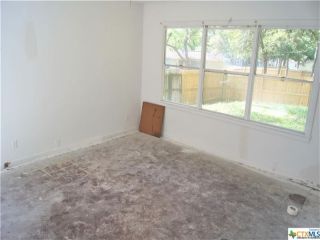 Foreclosed Home - 203 W BOBKAT, 77975