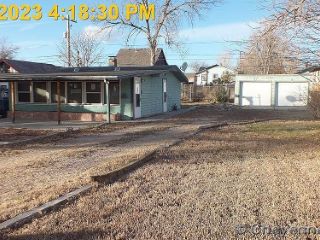 Foreclosed Home - 2118 E 12TH ST, 82001
