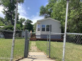 Foreclosed Home - 702 S OSBORNE AVE, 82716