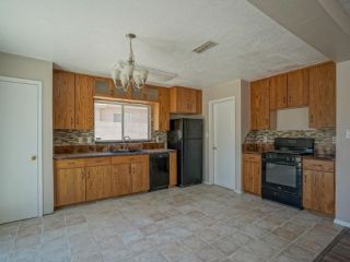 Foreclosed Home - 10216 ANDALUSIAN AVE SW, 87121
