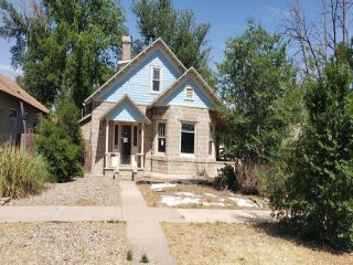 Foreclosed Home - 411 S Kentucky Ave And 311 W Hendricks St, 88203