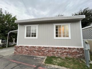 Foreclosed Home - 15798 SLOVER AVE SPC 26, 92337