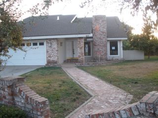 Foreclosed Home - 811 N BOLLINGER ST, 93291