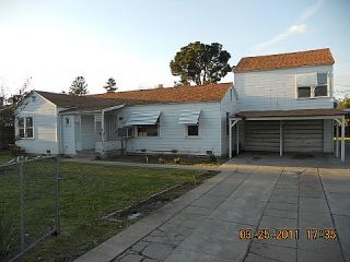 Foreclosed Home - 3043 E UNIVERSITY AVE, 93703